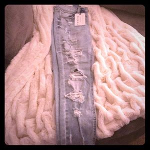 Fashionova midrise distressed jeans.